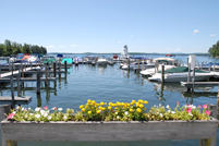 Lake Winnipesaukee - Lighthouse and flowers near Long Island Bridge
